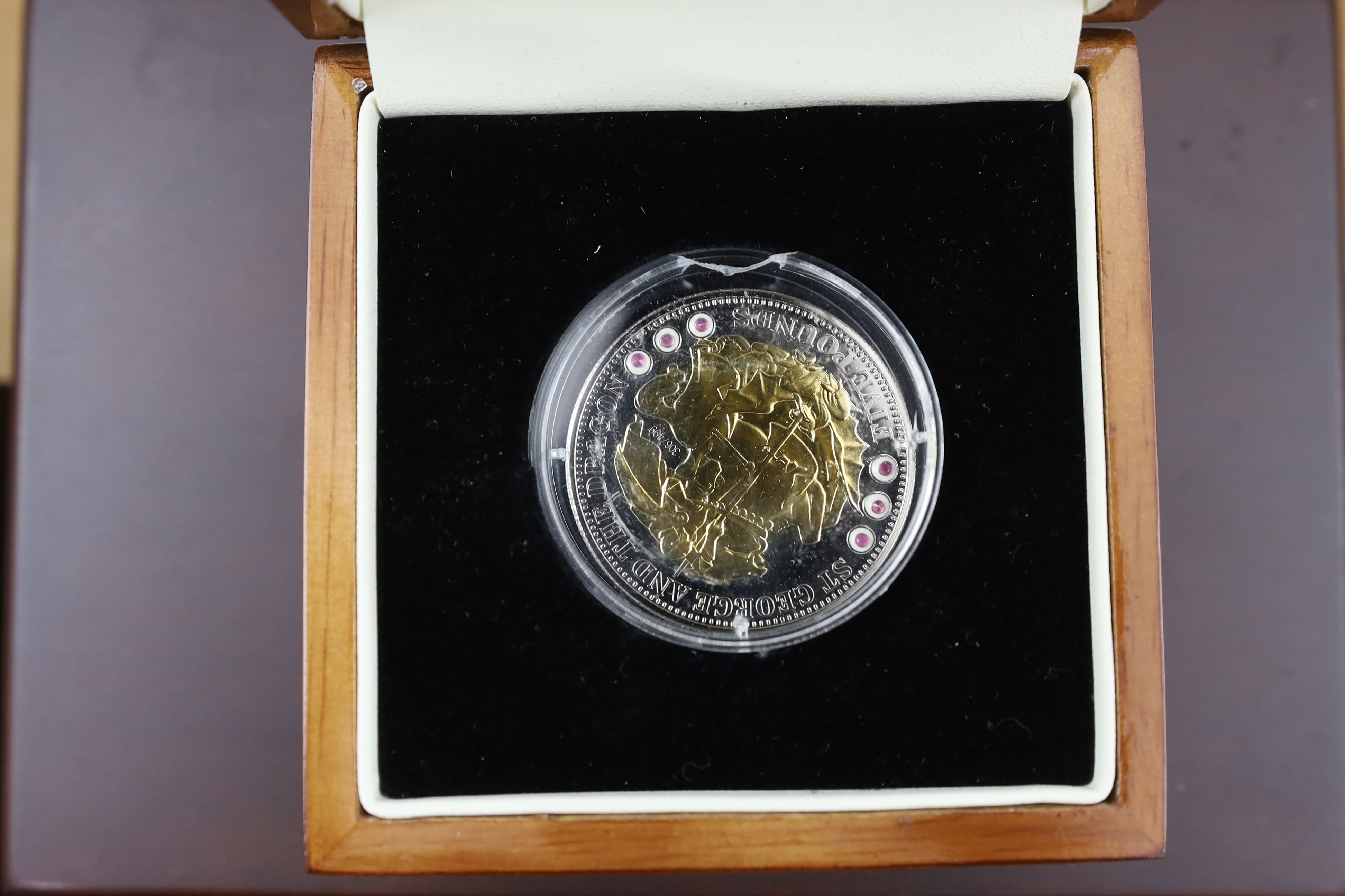 QEII and modern commemorative proof silver coins - Jersey 2014 2oz. ‘100 poppies’ coin, the First World War Centenary 2oz. numisproof, two London Mint 2009 Tristan de Cunha £5 coins, Royal Mint 2009 countdown XXX Olympia